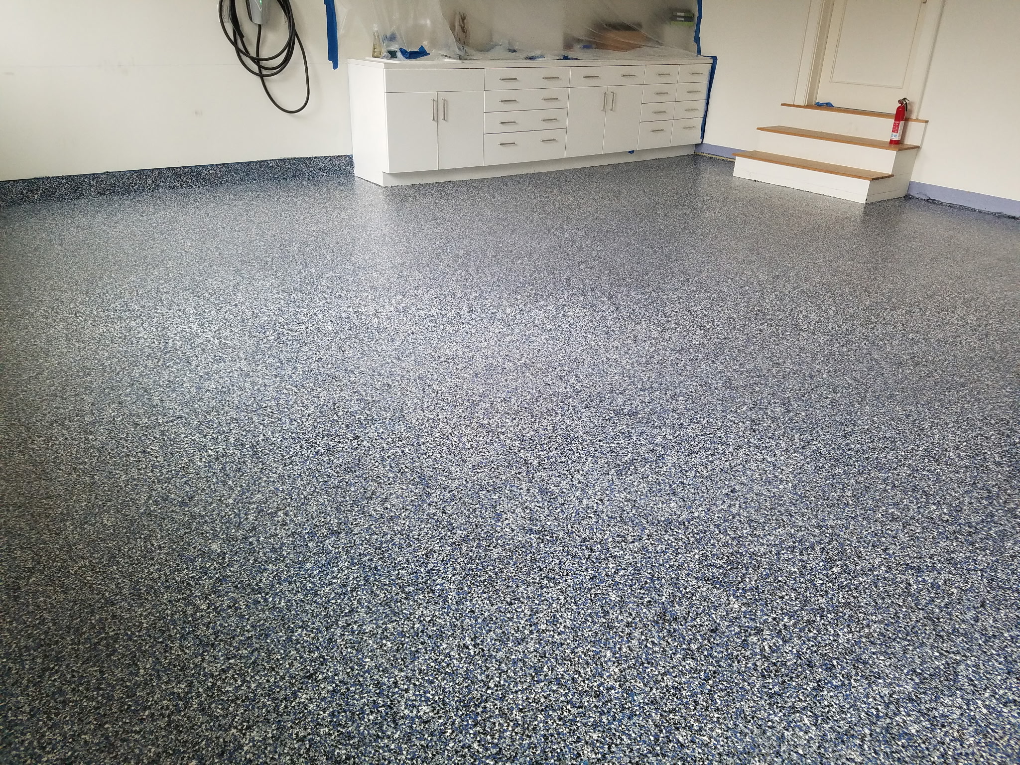 Finished blue flake epoxy garage floor