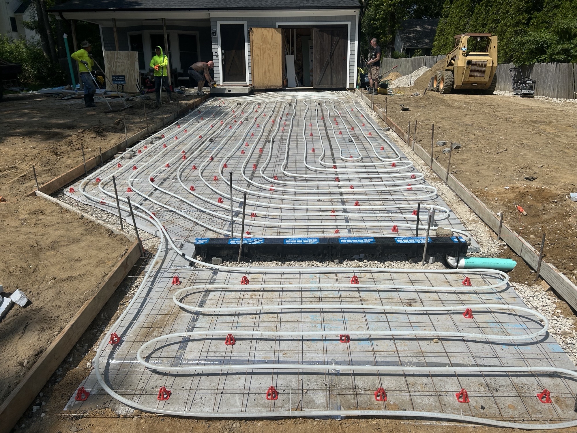 Radiant heat tubing installed before driveway pour