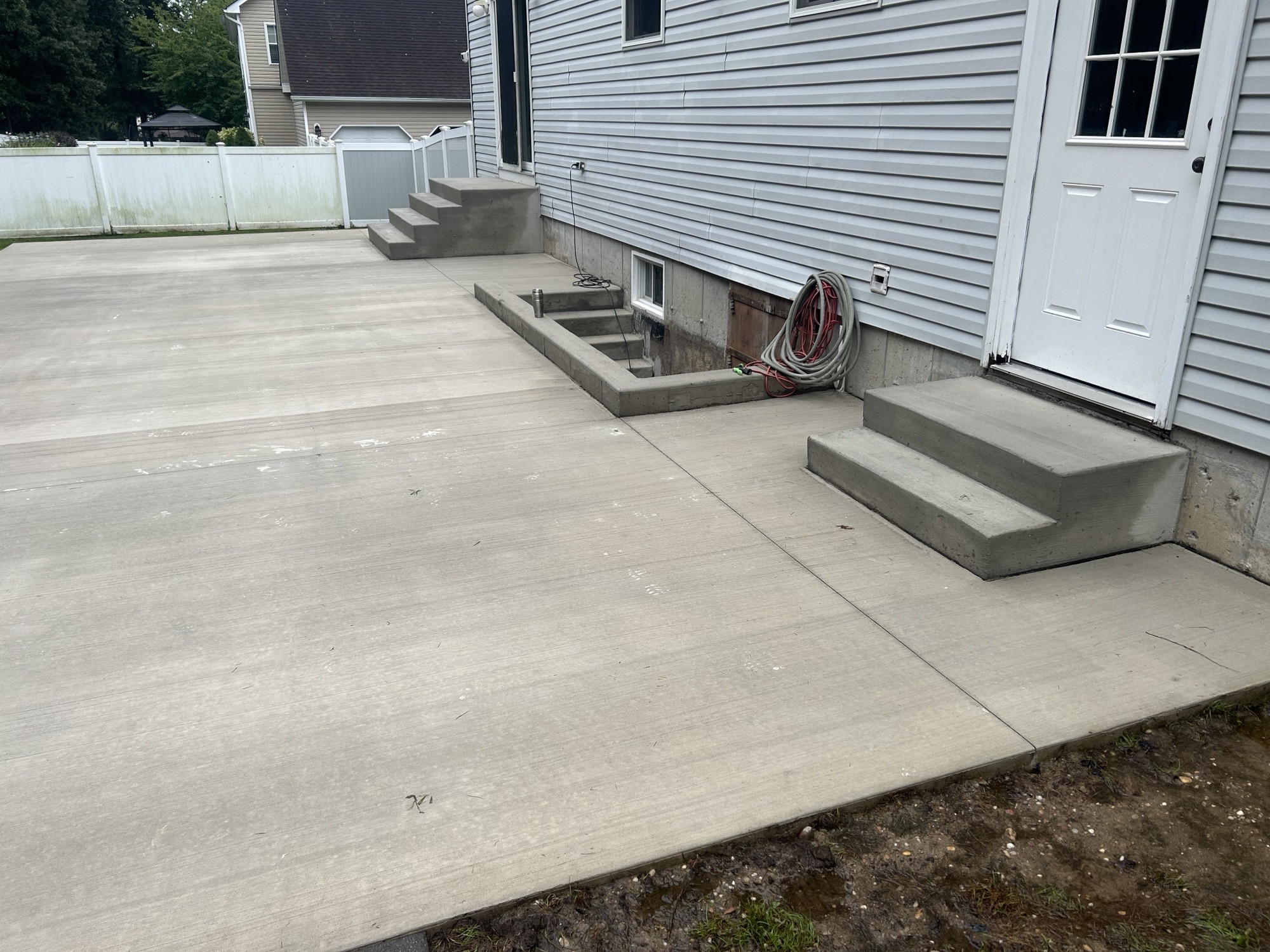 Broom-finish patio with integrated steps