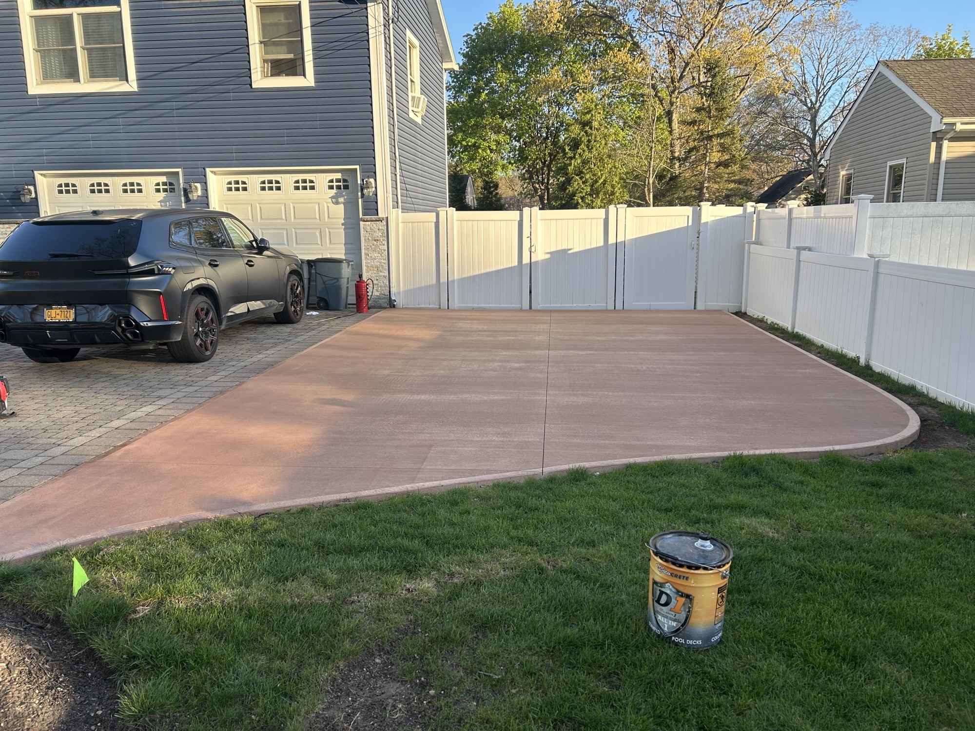 Colored concrete driveway pad
